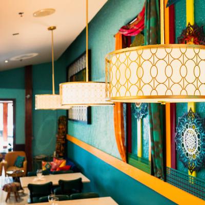 Interior, decor, light drum chandeliers in a dining area.