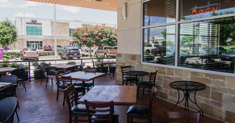 Exterior, patio, tables and chairs ready for guests