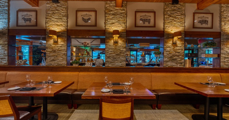 Interior, dining area with tables set for guests