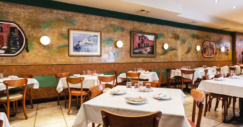 Interior, dining area with set tables ready for guests