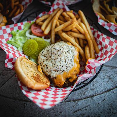 Farmer house burger and side fries.