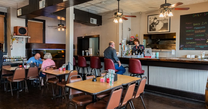 Diner area, table and chairs, food counter