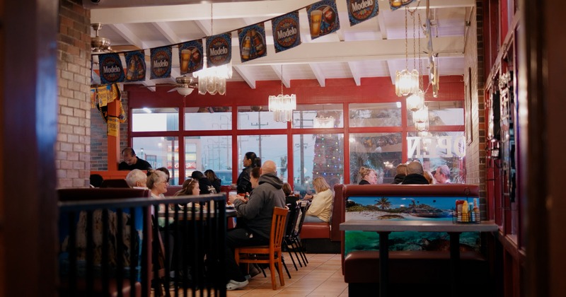 Interior, diner area, tables, chairs, guests
