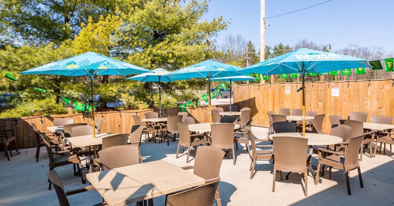 Exterior, patio, tables, chairs, parasols