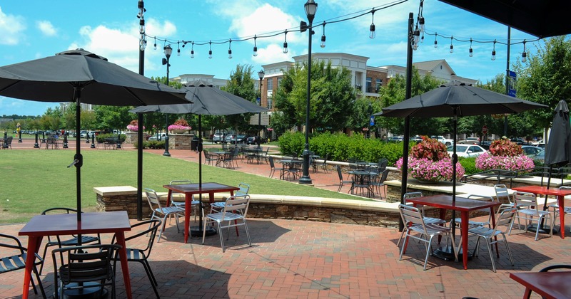 Exterior, patio, tables with parasols and chairs