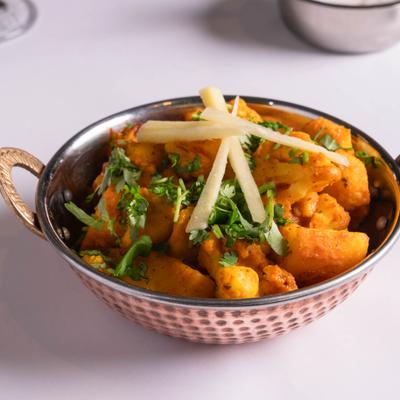 Fresh cauliflower and potatoes cooked with herbs & spices.