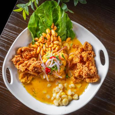 Fried fish ceviche in Peruvian yellow pepper sauce.