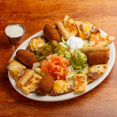 Mexican botanas snacks with dip.