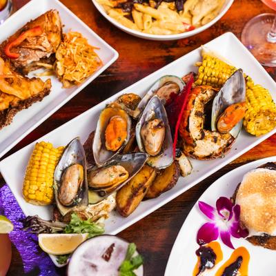 Seafood Boil on a table surrounded by other dishes.