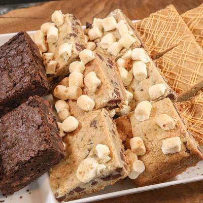 A platter of assorted dessert bars.
