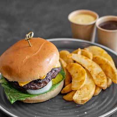 Aves Cheese Burger With Potato Wedges.