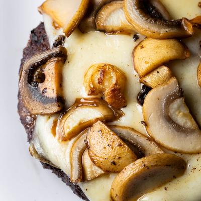 Fresh never frozen 1/4 lb cheeseburgers served with a side.