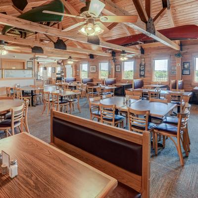 Dining area interior, tables and seating.