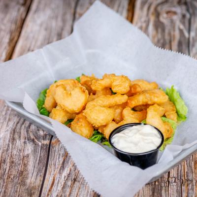 Fried shrimp served with a sauce for dipping.