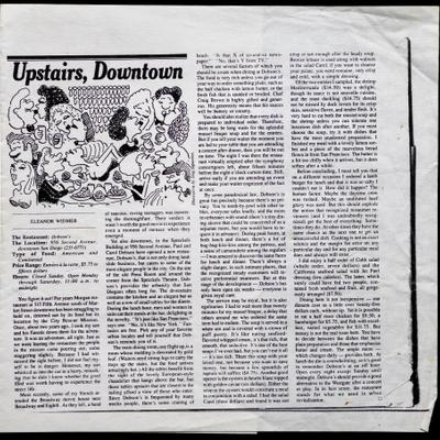 An article titled Upstairs, Downtown with a black and white cartoon of people kissing