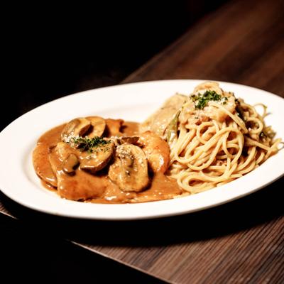 Veal Marsala served with  Spaghetti Carbonara.