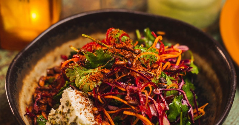 Salad of beets, carrots, queso fresco, dates, pumpkin seeds and lime