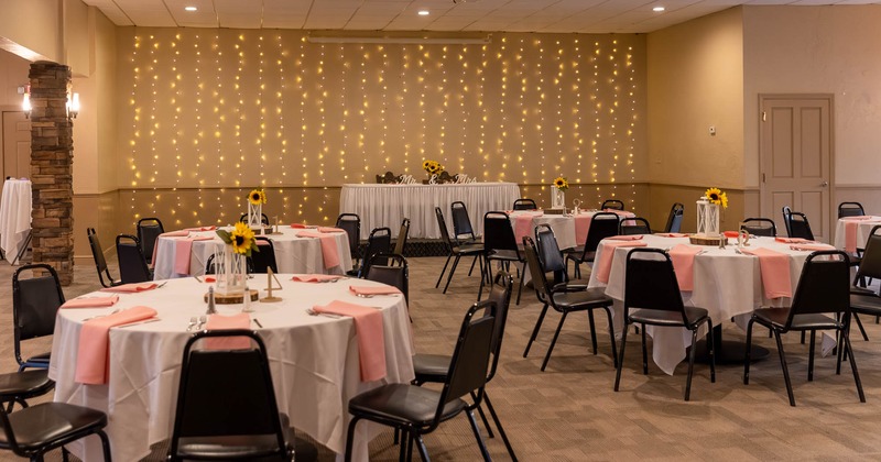 Interior, tables set for guests