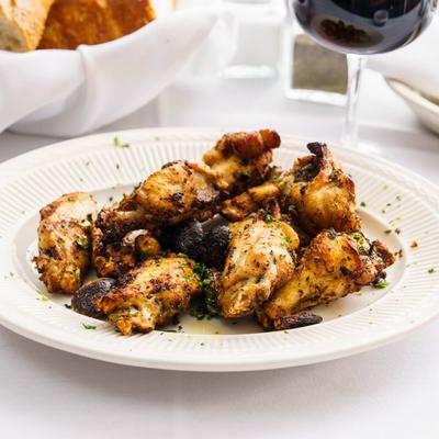 Chicken wings with cheese sauce