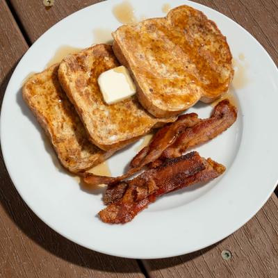 French toast with bacon and butter.