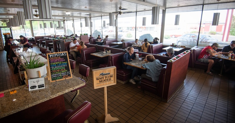 Interior dining area with guests enjoying their food