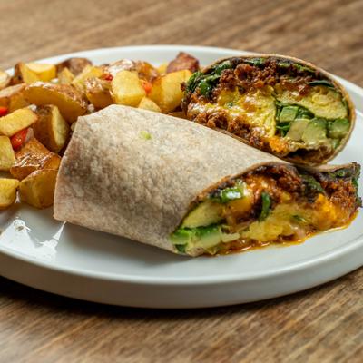 Yummy Burrito served with home fries.