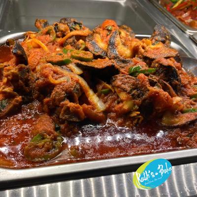 Spicy fish stew in rich tomato sauce.