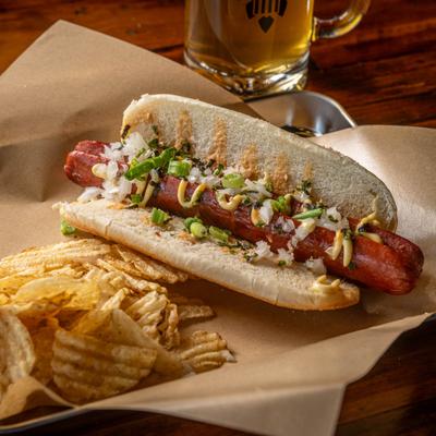 China Town hot dog, served with chips.