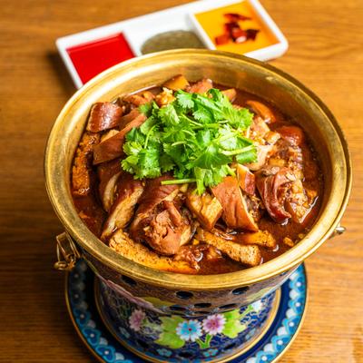 Bowl of pork, tofu, and intestine.