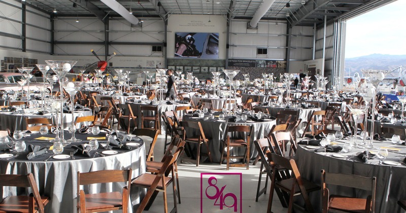 A large hall with tables and chairs