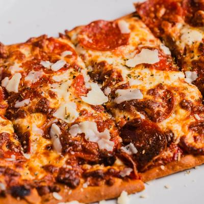 Pepperoni flatbread, close up.