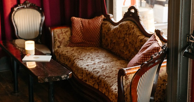 Interior, old fashion style sofa by the window