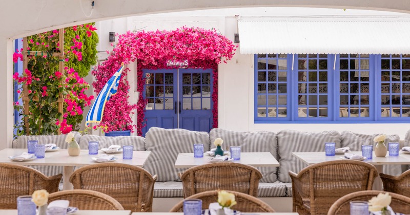 Exterior seating area with chairs and tables