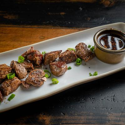 The Original George steak bites served with sweet heat teriyaki dipping sauce.