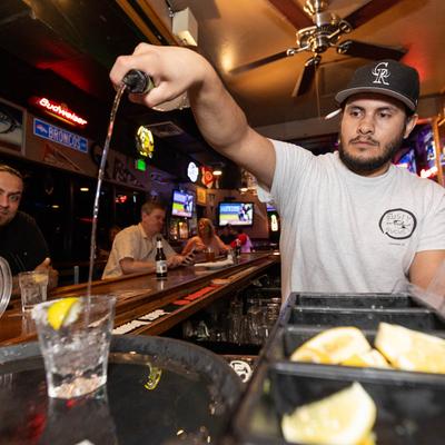 Bartender pouring a drink