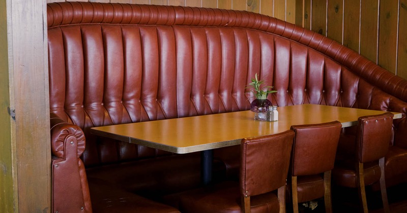 Interior, wall seating with table and chairs