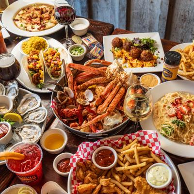 Assorted food and drinks on the table.