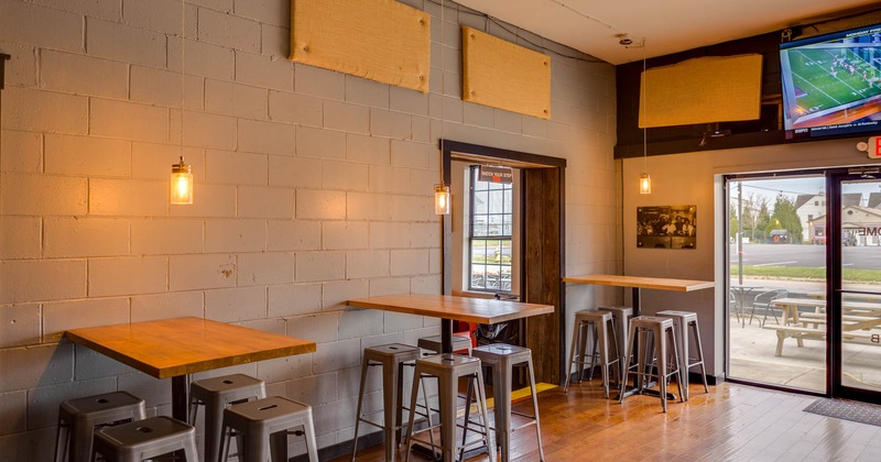 Dining area, tall tables and chairs