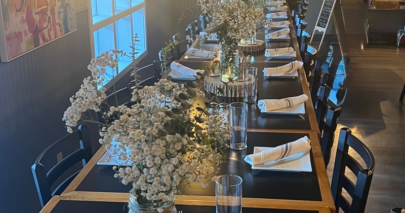 Interior, lined up tables and bar