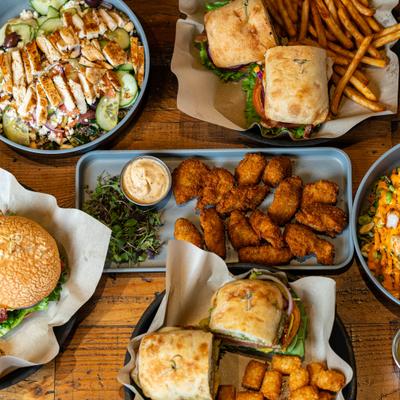 Various dishes served on the table, overhead view.