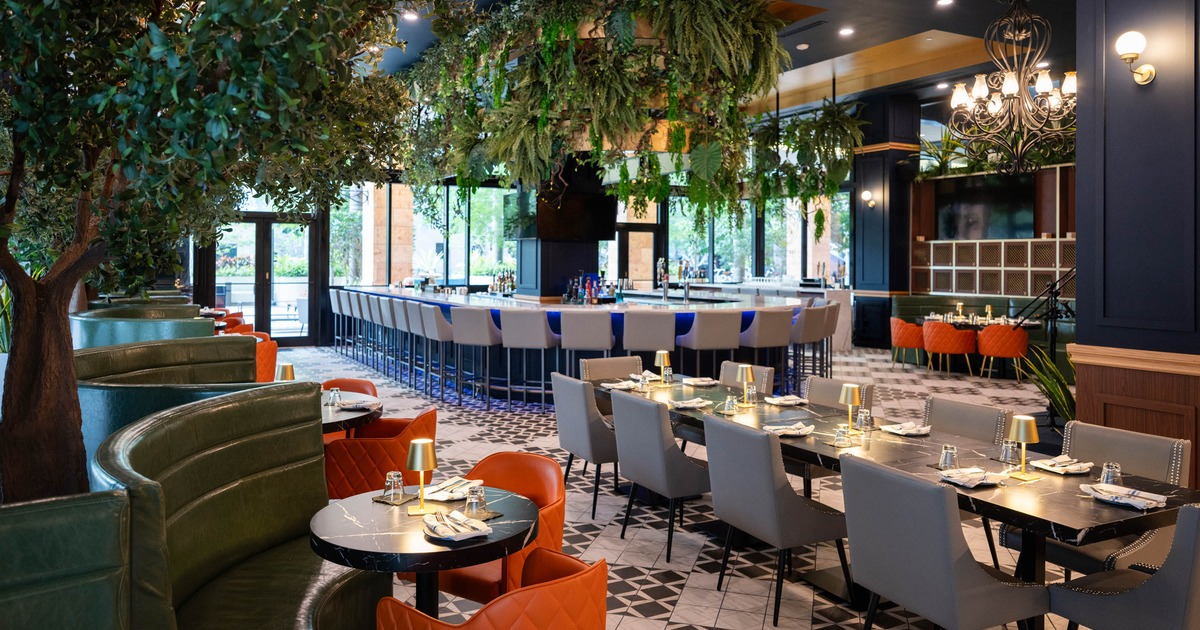 Interior, seating area, table for ten, banquette benches with tables and chairs