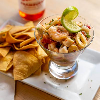 Shrimp cured in citrus juices served with tortilla chips