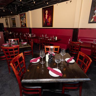 Dining area, fully set tables.