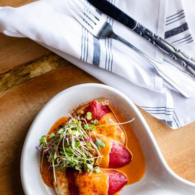 Goat cheese stuffed piquillo peppers, top view.