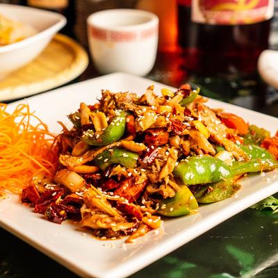 Spicy Tasty Rabbit Meat with peanuts, vegetables, sesame and noodles