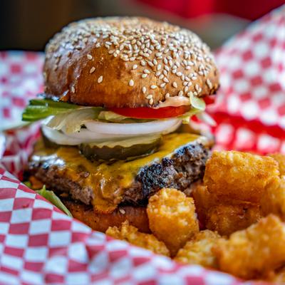 MST burger with tots, close up.