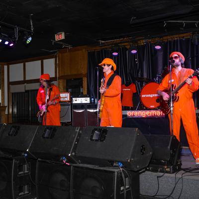 Live music. The Orangemen performing on stage..