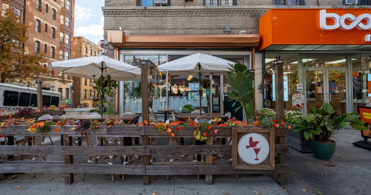 Exterior, patio, side walk, tables, chairs, parasols