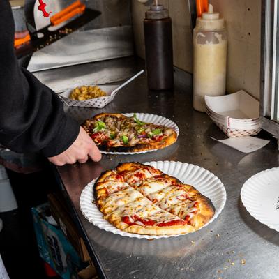 Pizza served in plates.