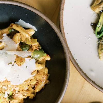 Two served meals, closeup.